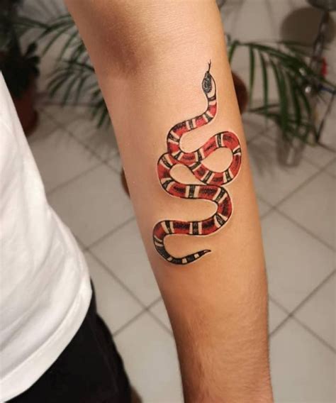 gucci snake tattoos.